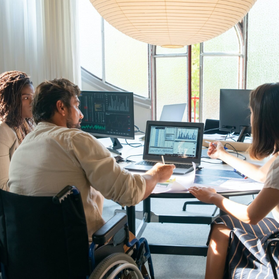 three employees working with data